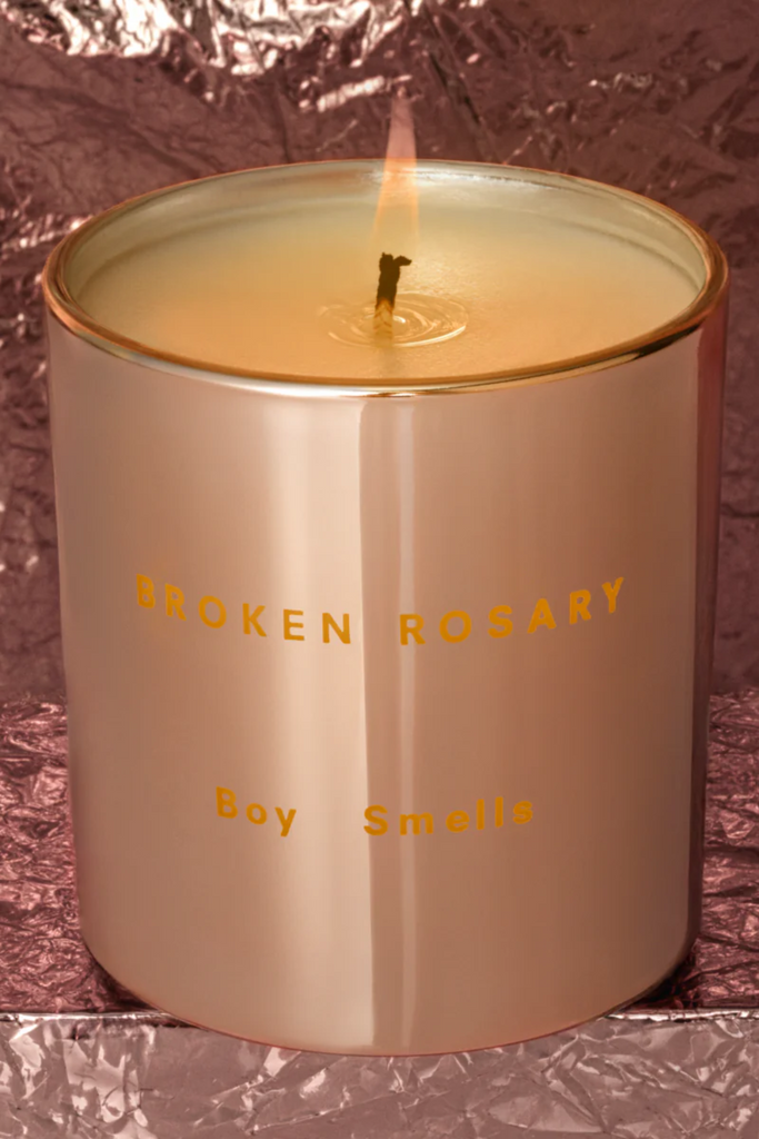 Boy Smells Holiday Broken Rosary Candle at Parc Shop | Minneapolis, MN